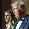 President-elect Donald Trump and his wife Melania Trump on stage during a candlelight dinner at the National Building Museum in Washington.