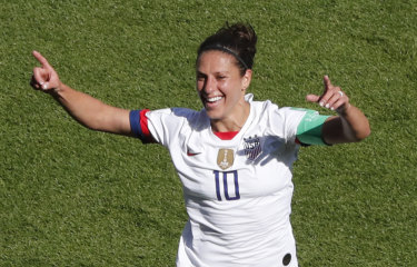 Carli Lloyd celebrates scoring for the US against Chile at the Parc des Princes in Paris on Sunday.