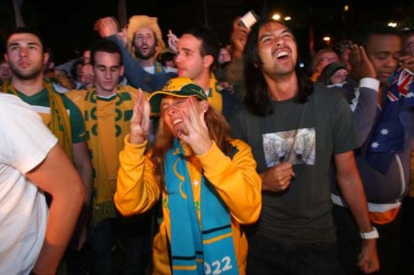 Heartbreak ... fans show their disappointment at the announcement that Qatar had won the right to host the 2022 World Cup