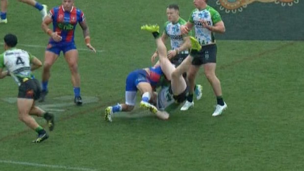 Dane Gagai tilts Corey Horsburgh into a dangerous position