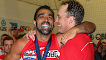 Adam Goodes and John Longmire after the 2012 grand final.