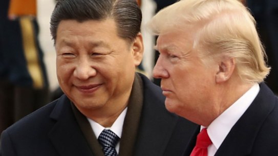 O presidente chinês, Xi Jinping, com o presidente dos EUA, Donald Trump.