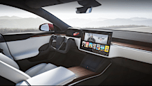 The new interior of the Model S includes a rectangular steering wheel with no stalks and a 17-inch high-definition screen in the centre console.