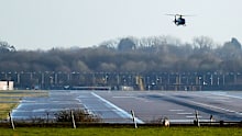 The body was found after the flight landed at Gatwick Airport.