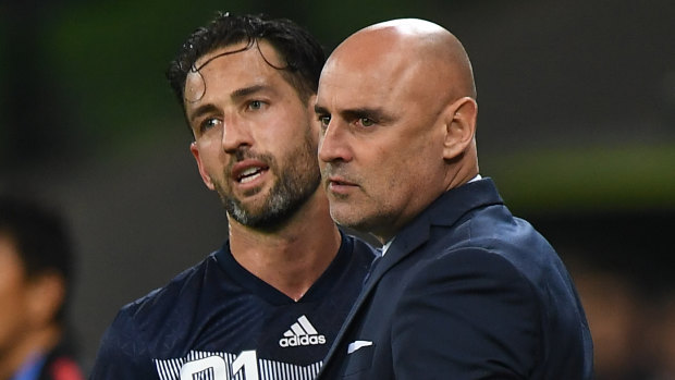 Bittersweet: captain Carl Valeri and coach Kevin Muscat during their last game with Melbourne Victory in the, AFC Champions League Group F match against Sanfrecce Hiroshima at AAMI Park.
