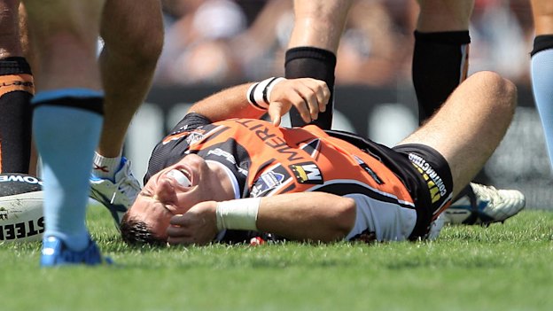 James Tedesco writhes in agony after tearing his ACL during his debut in 2012.