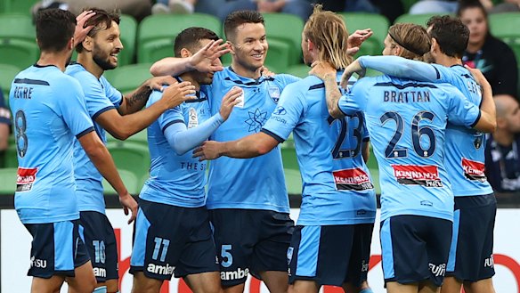 Sydney FC players celebrate after a Adam Le Fondre goal.