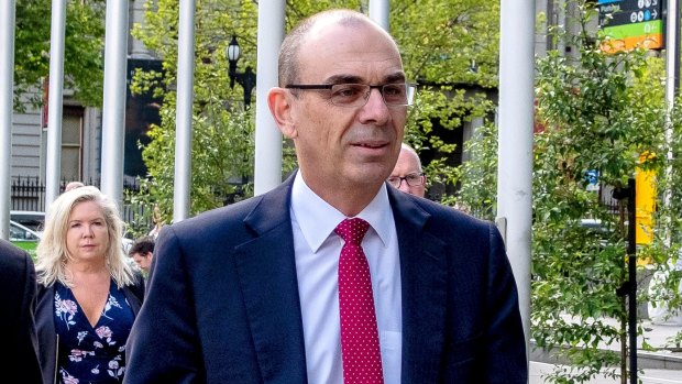 APRA chairman Wayne Byres arrives at the banking royal commission in Melbourne on Friday.