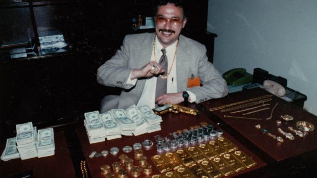 Javier Peña at the Colombian National Police Headquarters following a seizure of some of Escobar’s money, gold, and a .45 caliber gold-plated pistol. 