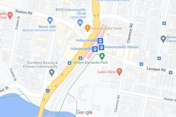 Map showing where a future bridge could go on land zoned as a transport corridor between Indooroopilly train station and former interrogation cells at Witton Barracks on the river. It shows the alignment of Lambert Road and Station Road as a possible rail overpass.