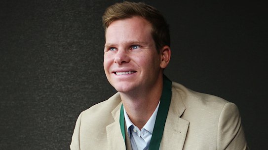 Steve Smith poses with the Allan Border medal. 