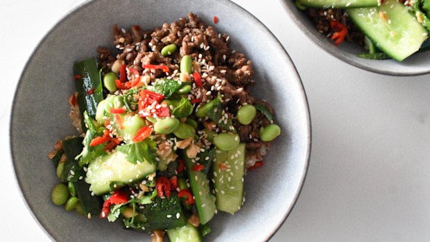 Sticky ginger beef bowls with smashed cucumber salad.