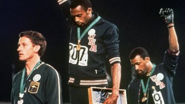 US athletes Tommie Smith, centre, and John Carlos and Australian Peter Norman, left, at the 1968 Olympics.