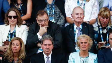 Former Tennis Australia director Harold Mitchell (centre) at the Australian Open.