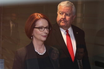Then prime minister Julia Gillard arrives with chief scientist Ian Chubb at the Prime Minister’s Science Engineering and Innovation Council meeting in Sydney in 2013.