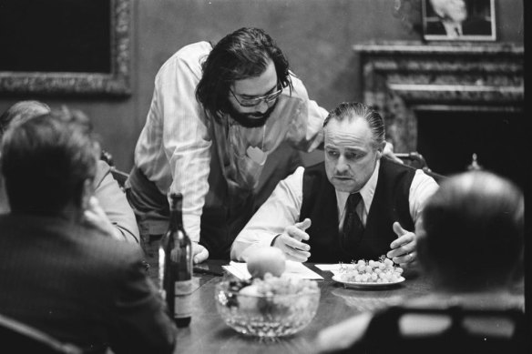 Francis Ford Coppola directs Marlon Brando in The Godfather.