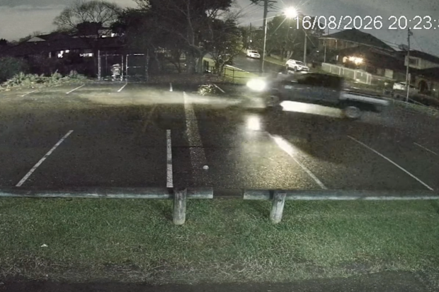 The dark-coloured ute was spotted making a bee-line for the pitch before skidding across the grass.