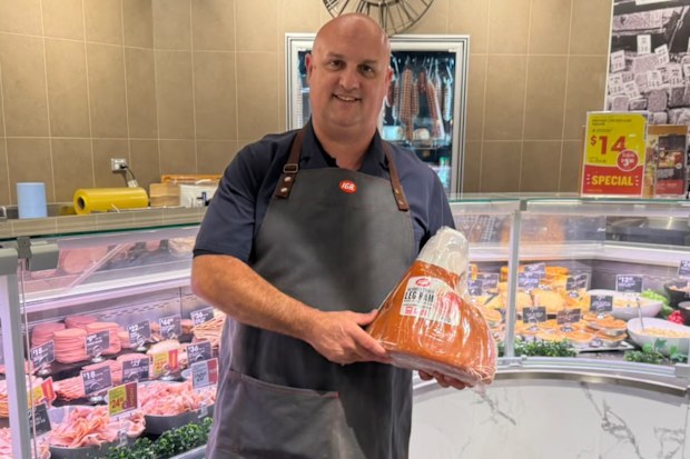 Christmas hams are now at IGA, butcher Jason Love with one of the hams