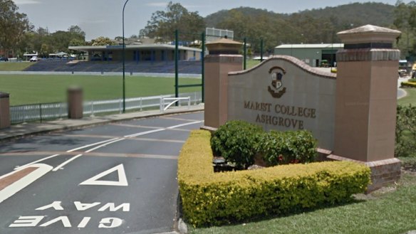 Students assembled at the Marist College Ashgrove grandstand after the fire broke out. 