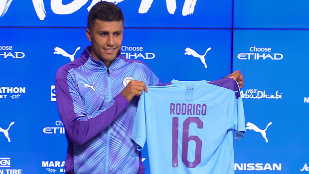Blockbuster signing: Rodri shows off his new colours.