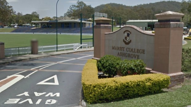 Students assembled at the Marist College Ashgrove grandstand after the fire broke out. 