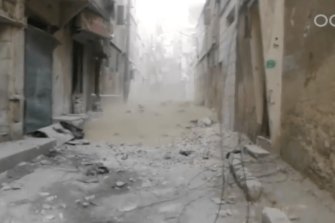 Still from a video shows chlorine gas descending on an Aleppo street in 2016. 