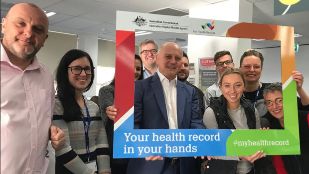 Tim Kelsey (centre), head the Australian Digital Health Agency, which is rolling out My Health Record.