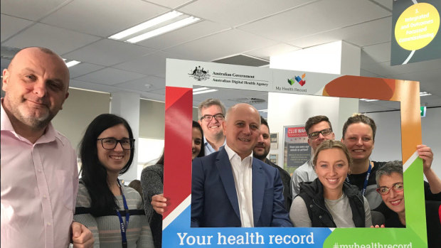 Tim Kelsey (centre), head the Australian Digital Health Agency, which is rolling out My Health Record.