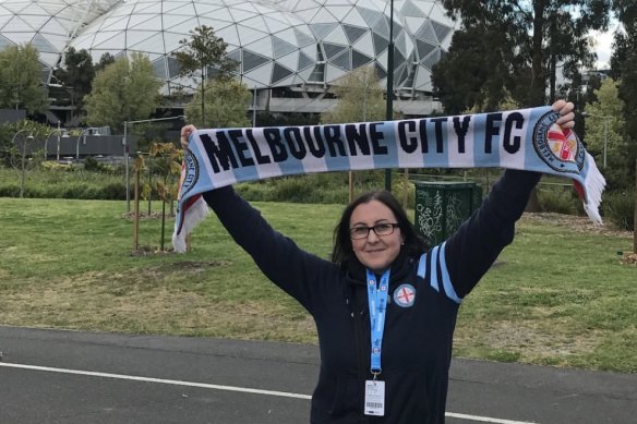Niki Tolios with her Melbourne City scarf outside the club’s home ground at AAMI Park.