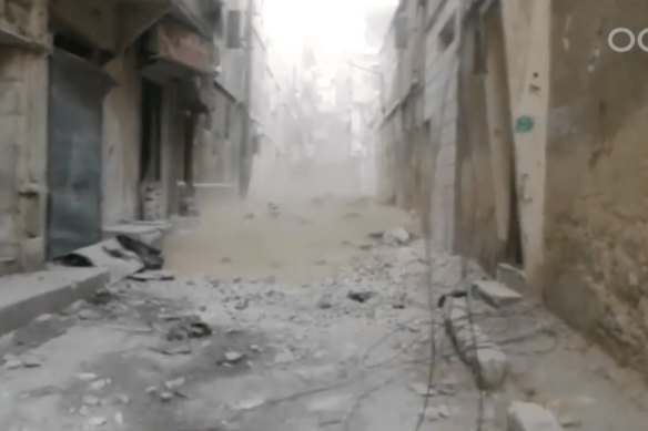 Still from a video shows chlorine gas descending on an Aleppo street in 2016. 