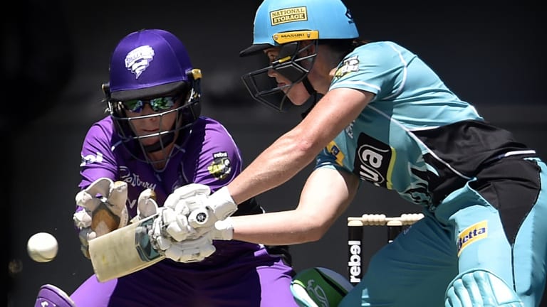 Player of the match: Grace Harris guides the ball away during her knock of 32 against the Hurricanes in Launceston.