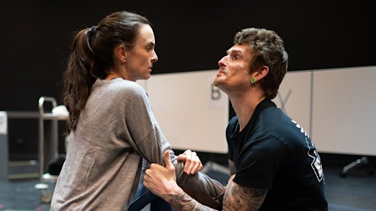 Zoe de Plevitz (Jess) and Dan Daw (John) rehearse Cost of Living at Queensland Theatre. The script specifies that John be played by a disabled actor.