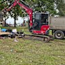 Tents being destroyed at an encampment in April after Moreton Bay Council made camping on public land illegal. 