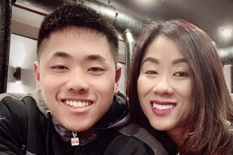 Thomas Tran and his mother Amy.