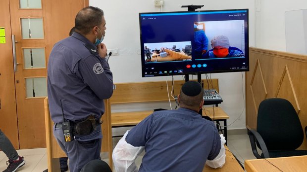 Accused child sex abuser Malka Liefer appears via video link in an Israeli court.