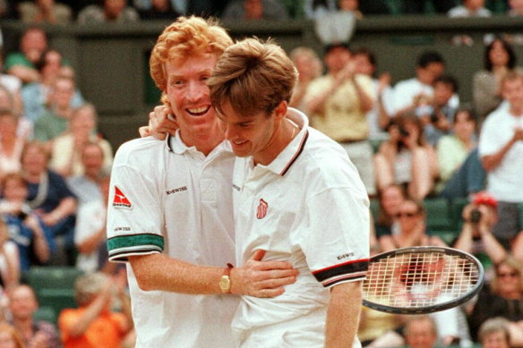 The Australian doubles team of Mark Woodforde and Todd Woodbridge celebrate after beating Paul Haarhuis and Jacco Eltingh of the Netherlands.