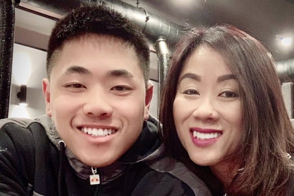 Thomas "Tommy" Tran and his mother Amy. 