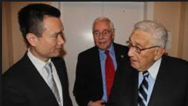 The mystery princeling, known as Ye Jianming with Henry Kissinger in 2013. 