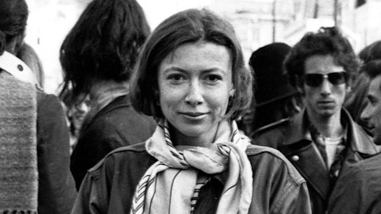 Joan Didion with a crowd of hippies in San Francisco's Golden Gate Park in 1967 while researching her article Slouching Towards Bethlehem.