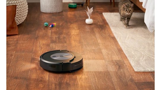 The Roomba Combo J7+ vacuums and mops, with its mop pad able to be stored on top of the unit when not needed.