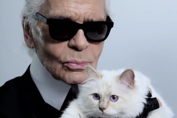  German fashion designer Karl Lagerfeld with his beloved Choupette.