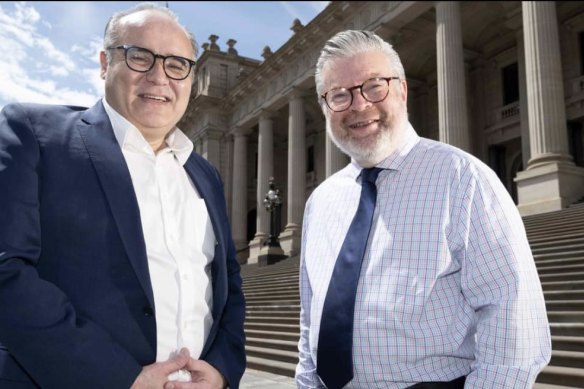 Democratic Labour Party Leader Bernie Finn (right) welcomes former state government minister Adem Somyurek.