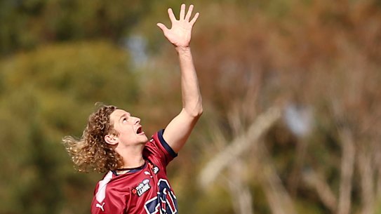 Mid-season draft prospect Jacob Edwards warms up at training.