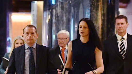 Crown Resorts executive chairman 
John Alexander (left) and company secretary Mary Manos arrive at the company's AGM on Thursday. 