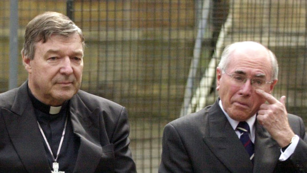 George Pell and John Howard in 2004. The former prime minister has provided a reference for Pell in the wake of his conviction for sexual assault.