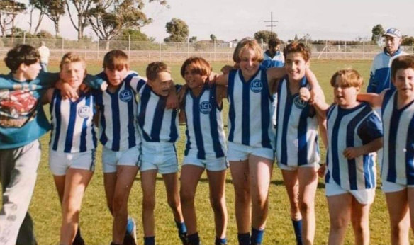 Good mates:  Dean Formosa, fifth from left, age 12 in 1997, singing the team song after a match.