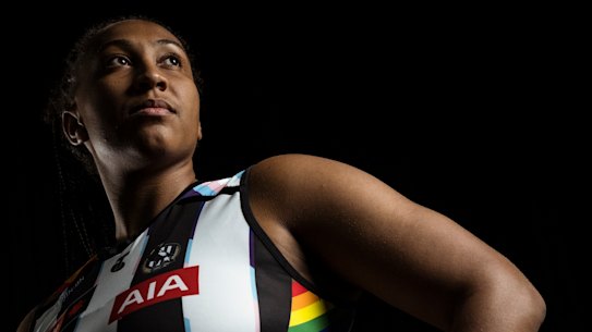 Sabrina Frederick models Collingwood’s pride guernsey.