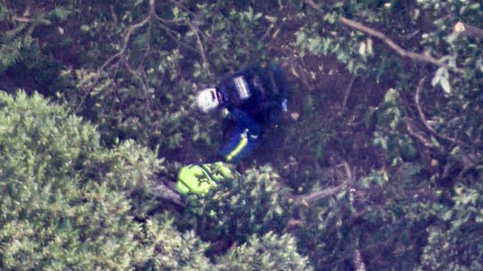 Rescue workers at the site of the landslide in the Blue Mountains.