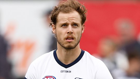 Jake Kolodjashnij warms up at Norwood Oval, where he will make his long-awaited return to the Geelong team.