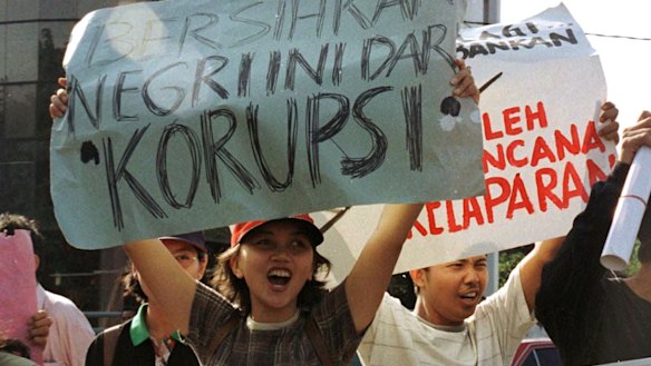 Old problem: Students hold up posters reading “Clean the country of corruption” during an anti-government protest in Jakarta in 1977.
